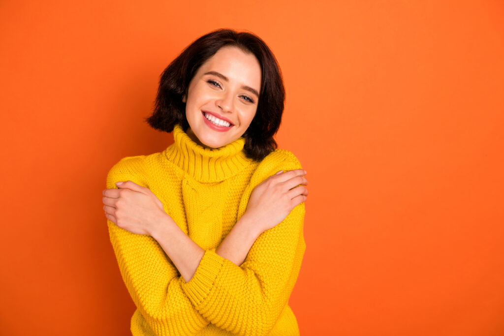 Photo Of Attractive Beautiful Nice Cute Charming Trendy Gorgeous Casual Girlfriend Warmened With Sweater Feeling Perfect While Isolated With Orange Background