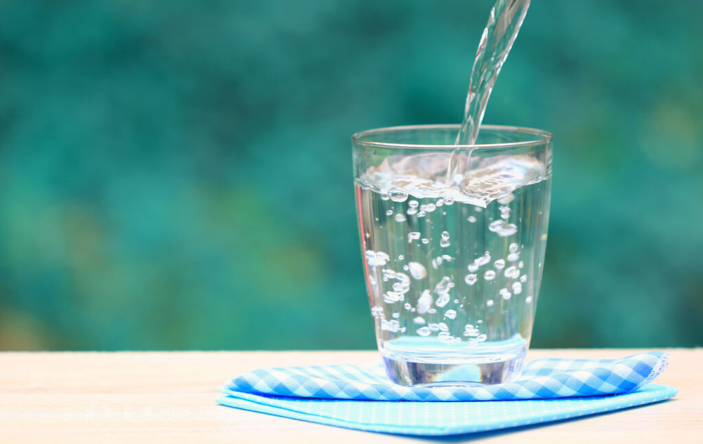 Closeup Glass Of Water On Table Nature Background