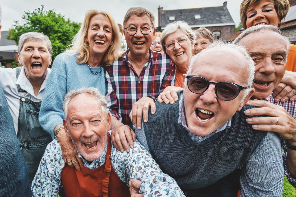 Joyful Seniors Taking A Group Selfie